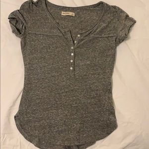 gray and white button up shirt